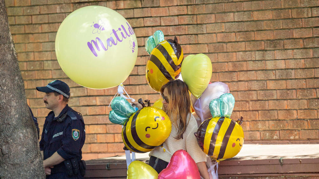 Воздушные шары на похоронах Матильды (Фото: REUTERS/Jeremy Piper) הלוויה של הילדה מתילדה ב סידני אוסטרליה שנרצחה טבח פיגוע