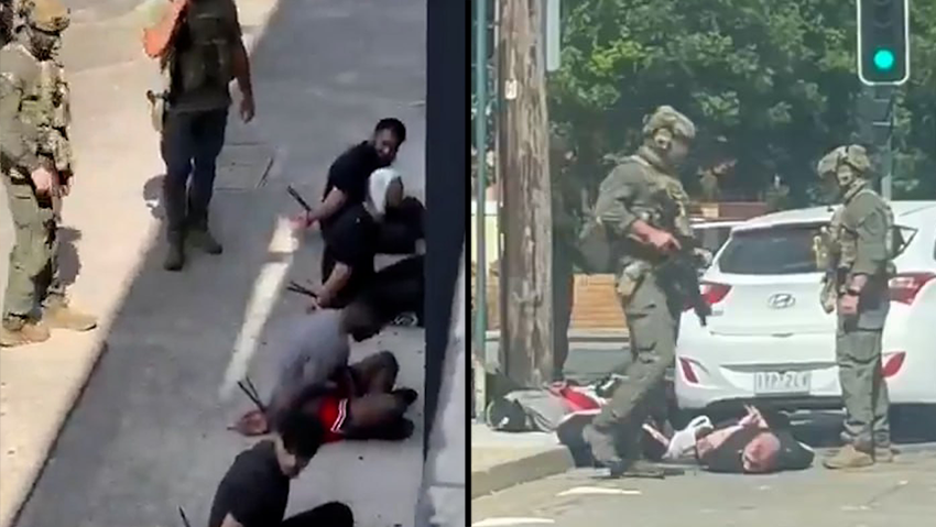 Armed police arrest several suspects on a Sydney road Thursday, Dec. 18, 2025, following intelligence about a possible planned attack תיעוד ממעצר של חשודים ב סידני אוסטרליה בצל המתיחות הגדולה אחרי פיגוע שם