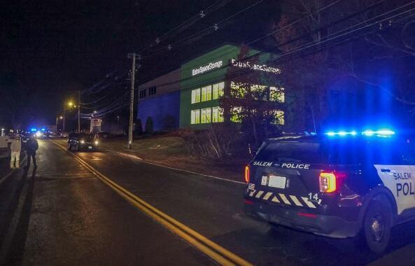 Police on scene at the Extra Space Storage facility where the Brown University shooting suspect was found dead 