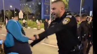 שוטר גרר אם ובתה בהפגנת החרדים: "קראו 'נאצים'"