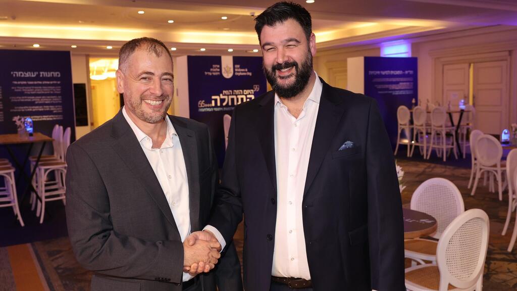 Проф. Итай Песах и Шломи Нахумсон 