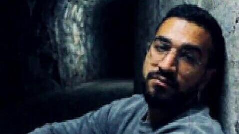 Сгенерированный ИИ образ Гвили (Фото: штаб семей заложников) סרטון AI שבו רן גואילי פונה לנשיא ארה"ב דונאלד טראמפ