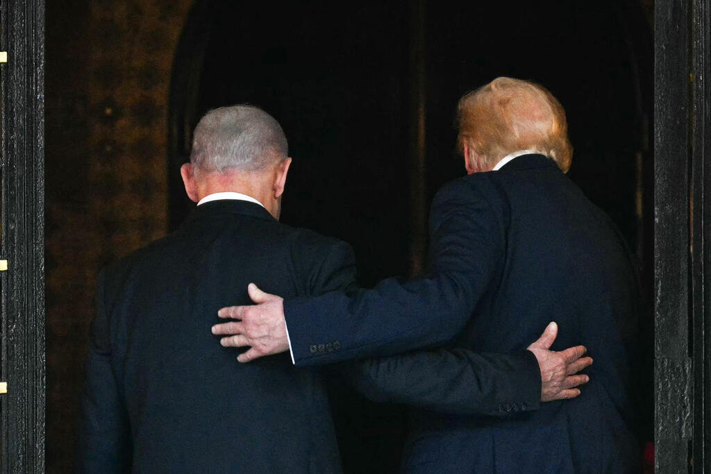 Netanyahu and Trump (Photo: Jim WATSON / AFP) רה"מ בנימין נתניהו ונשיא ארה"ב דונלד טראמפ בפגישתם במאר-א-לאגו