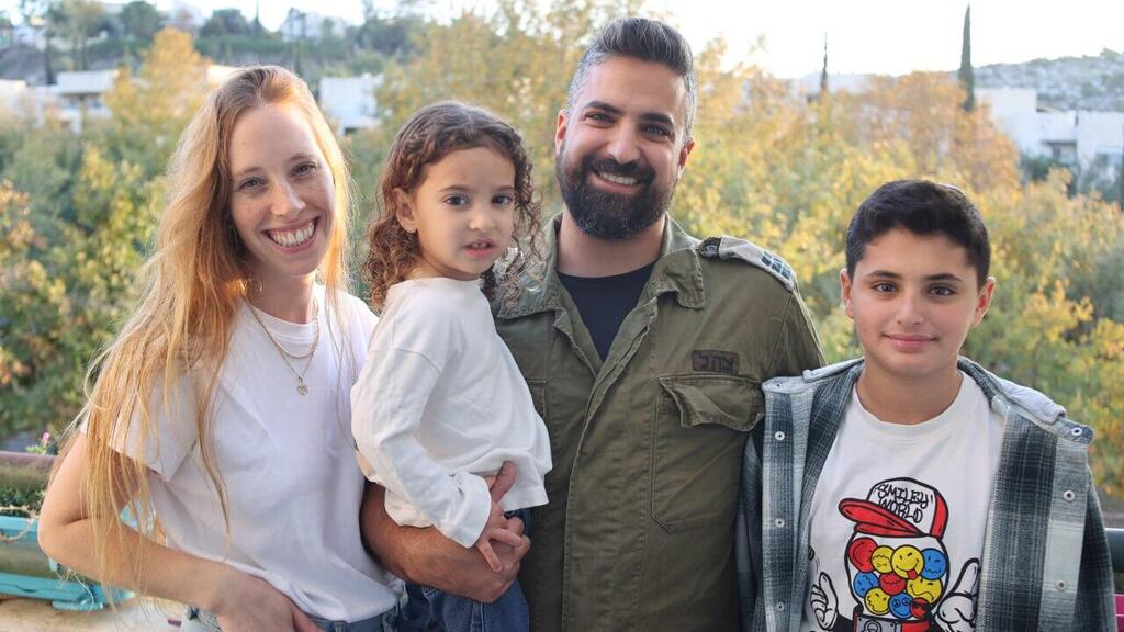 'Learning now how to live again as a family,' Noga, Tomer and their children, Oz and Maayan (Photo: Yariv Katz) משפחת אליאסף - נגה ותומר בעלה המילואימניק, וילדיהם - עוז ומעיין