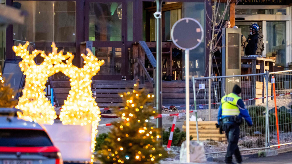 Photo: MAXIME SCHMID / AFP שווייץ אסון שריפה עשרות הרוגים בר עיירת סקי קראנס מונטנה הזירה