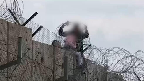 תיעוד מהברחת הילדה דרך הגדר בירושלים