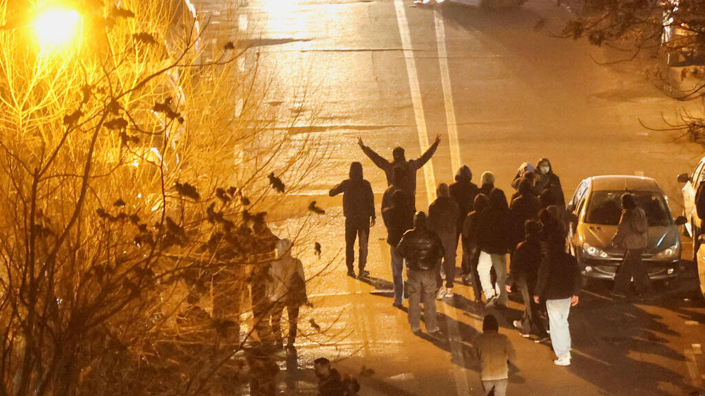 Демонстранты в Тегеране (Фото: Stringer/WANA (West Asia News Agency) via REUTERS) מפגינים ב טהרן 8 בינואר 2026 מחאה איראן