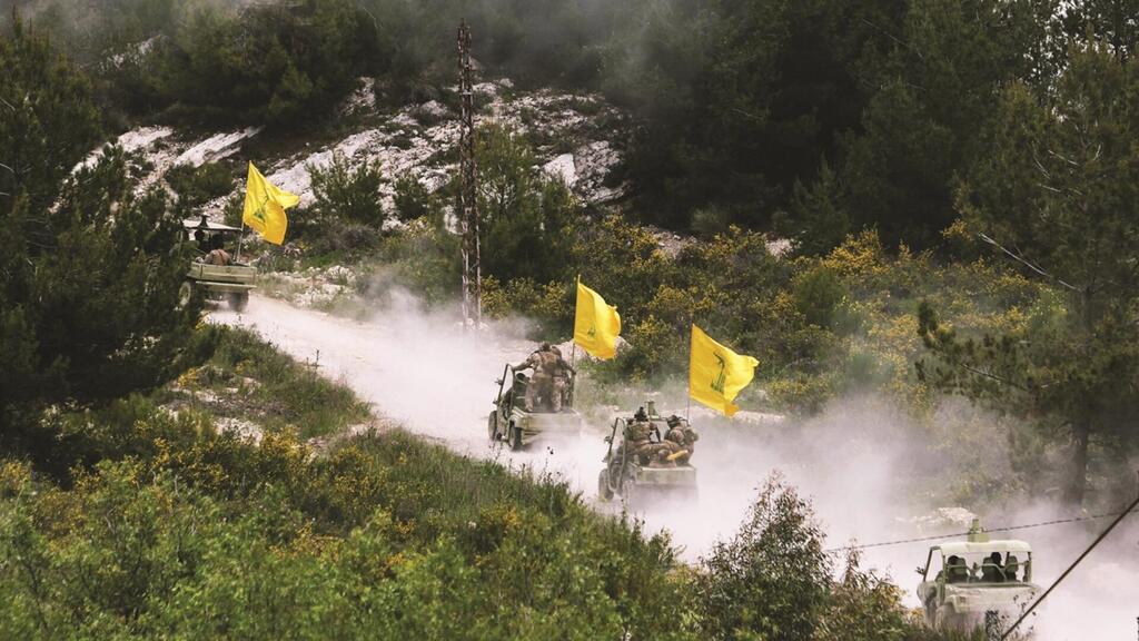 Hezbollah forces (Photo: Aziz Taher/Reuters) Hezbollah forces