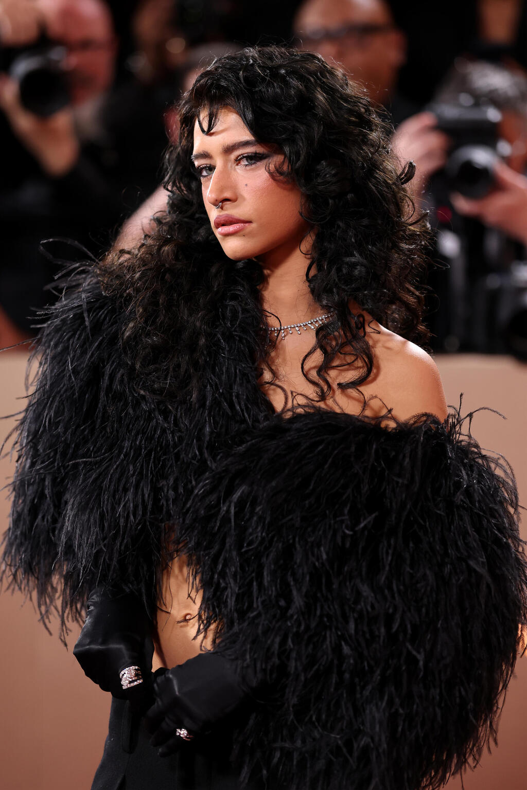 רעמת האריה בגולובוס הזהב 2025 (Monica Schipper/Getty Images) אודסה אזיון