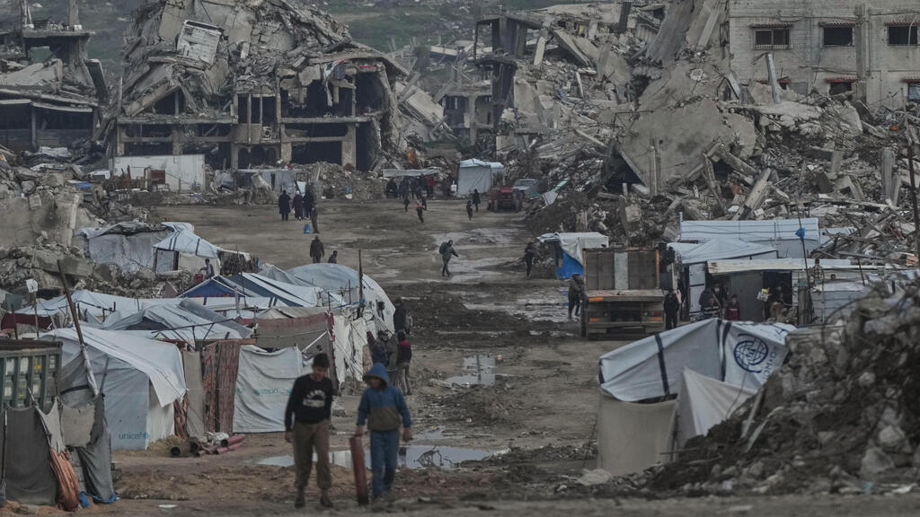 Развалины района Зейтун в городе Газа (Фото: AP Photo/Jehad Alshrafi) שכונת זייתון