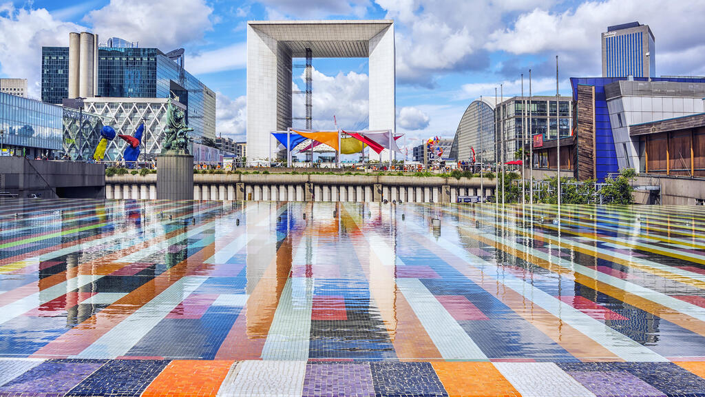Kinetic fountain created by Agam in the plaza of La Défense in Paris, titled 'La Fontaine' (Photo: Marina Datsenko, Shutterstock) Grand Arche, the central building of district La Defense in Paris