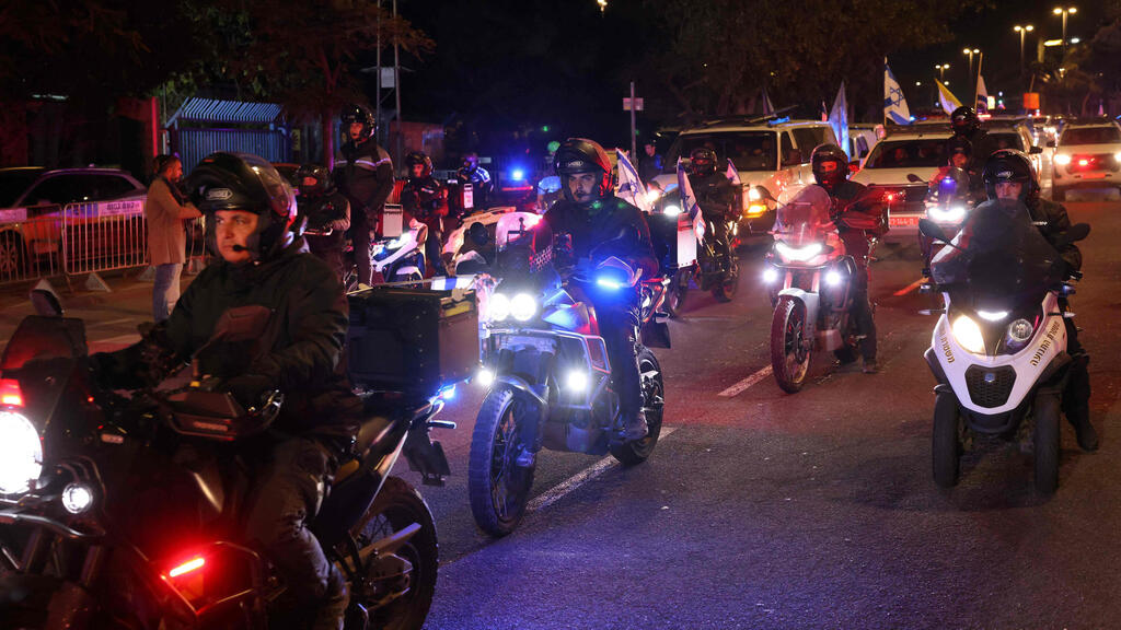 Israel Police convoy escorting Sergeant First Class Ran Gvili (Photo: Ilia Yefimovich/ AFP) שיירת הליווי של רס״ר רן גואילי ז״ל