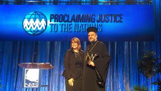 Laurie Cardoza Moore with Israeli priest Father Gabriel Naddaf 