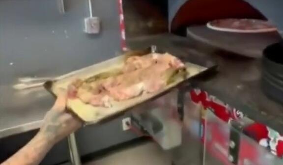 Iguana pizza (Photo: Screenshot CBS) Iguana pizza