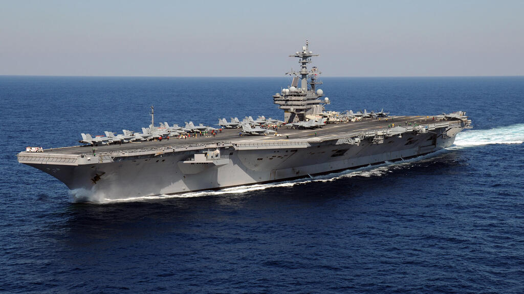 USS George H.W. Bush aircraft carrier (Photo: MC3 (SW) Nicholas Hall/Wikipedia) נושאת המטוסים ג'ורג' בוש