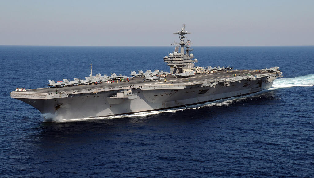 USS George H.W. Bush aircraft carrier (Photo: MC3 (SW) Nicholas Hall/Wikipedia) נושאת המטוסים ג'ורג' בוש