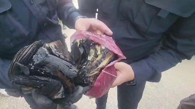 Tefillin and siddur burned in arson attack on a police motorcycle at an ultra-Orthodox demonstration in Bnei Brak (Photo: Israel Police) תפילין וסידור שנשרפו בהצתה של אופנוע משטרתי בהפגנת החרדים בבני ברק