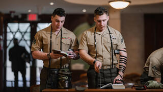 Jewish service members pray while wearing tefillin 