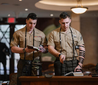 Jewish service members pray while wearing tefillin 