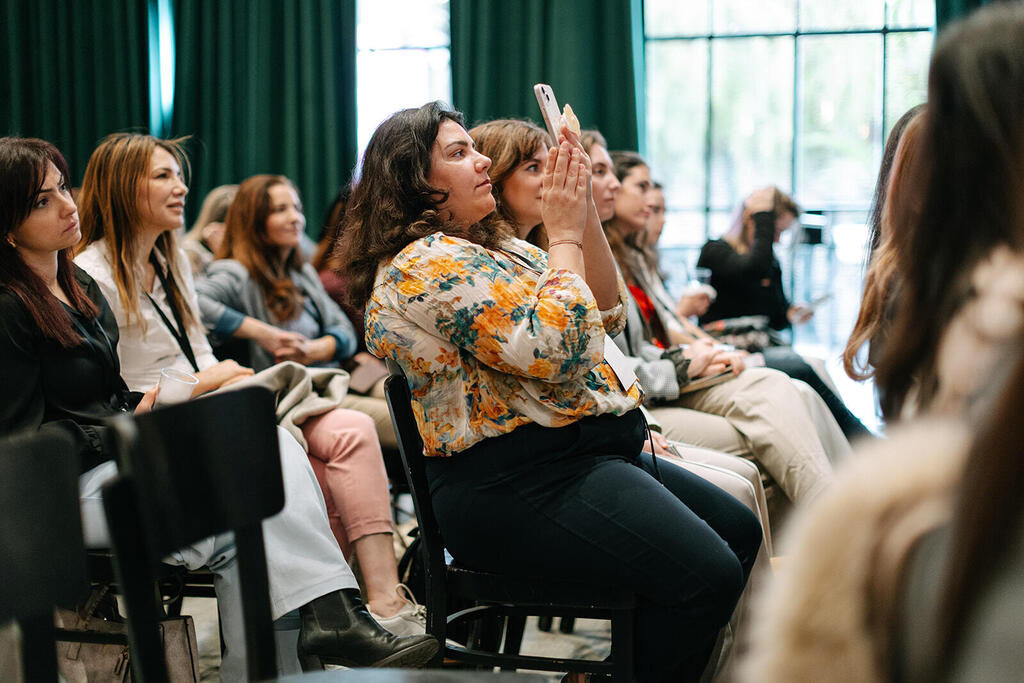 Attendees listen during a panel discussion at the Women Shaping the Future of Business, Tech & IP event in Tel Aviv 