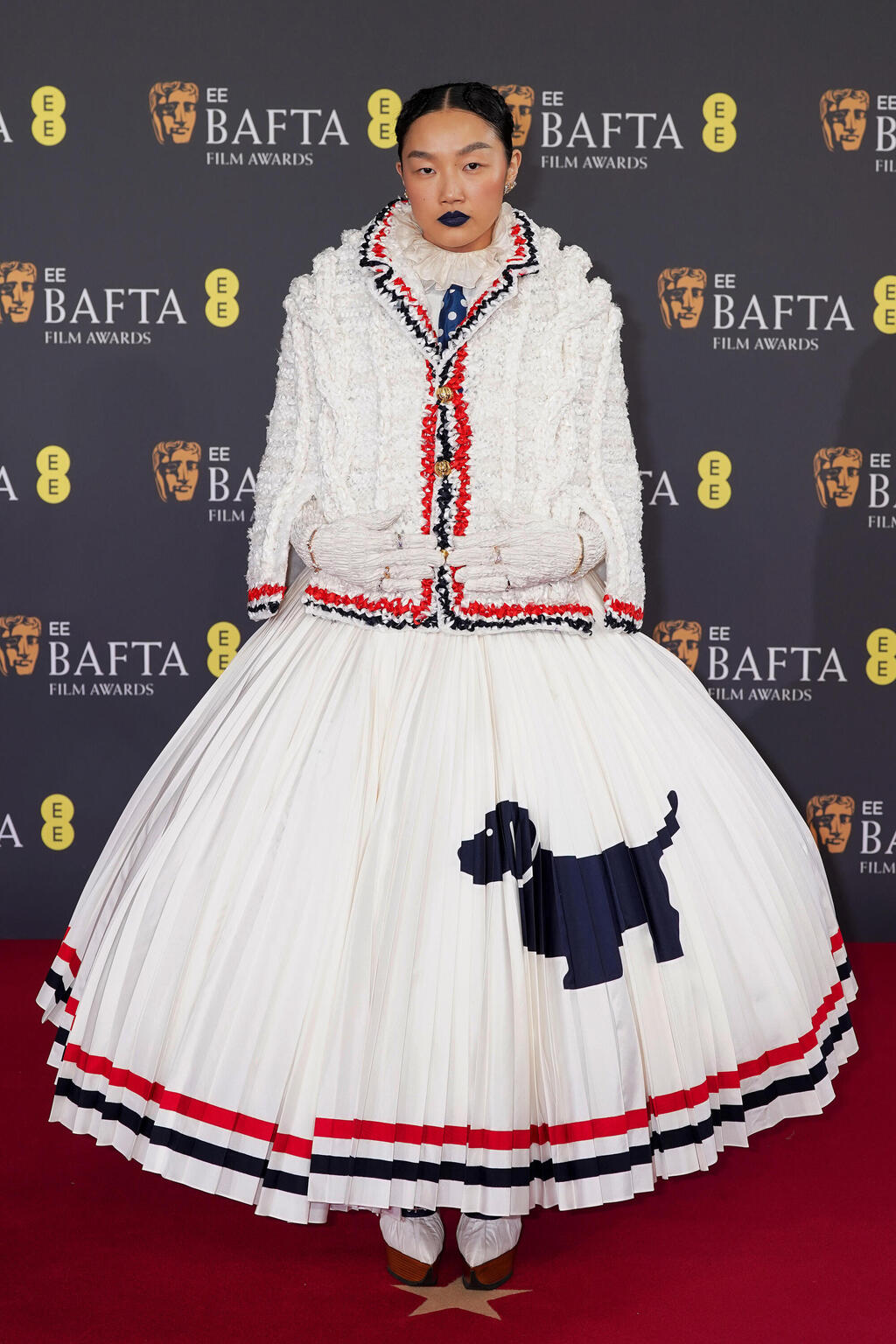Audrey Nuna in Thom Browne (Photo: Dominic Lipinski/Getty Images) אודרי נונה בטקס פרסי הקולנוע הבריטיים, 2026
