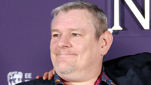 רוברט ארמאיו וג'ון דיווידסון בטקס הבאפט"א