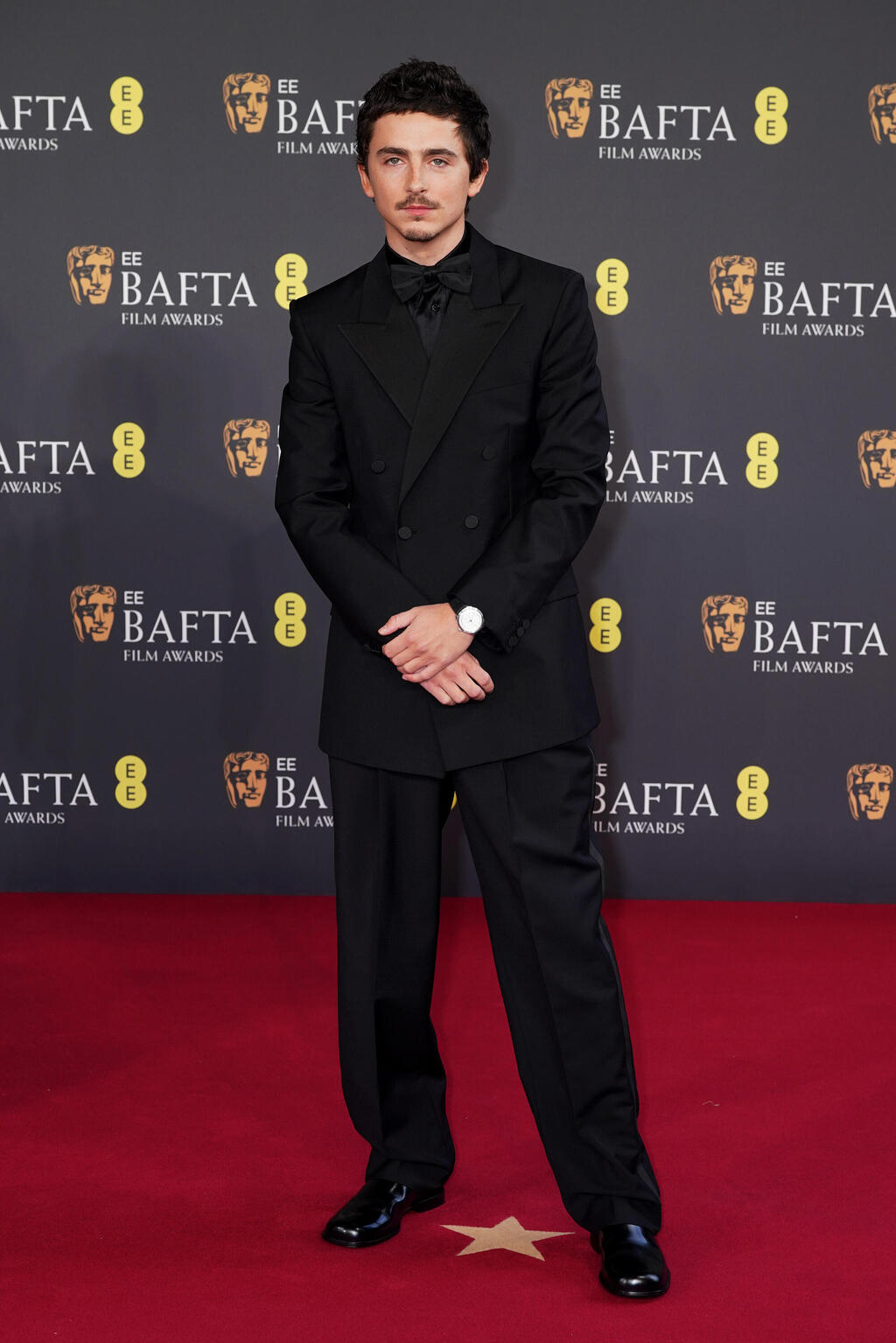 Timothée Chalamet wears Givenchy (Photo: Dominic Lipinski/Getty Images) טימותי שאלאמה בטקס פרסי הקולנוע הבריטיים, 2026