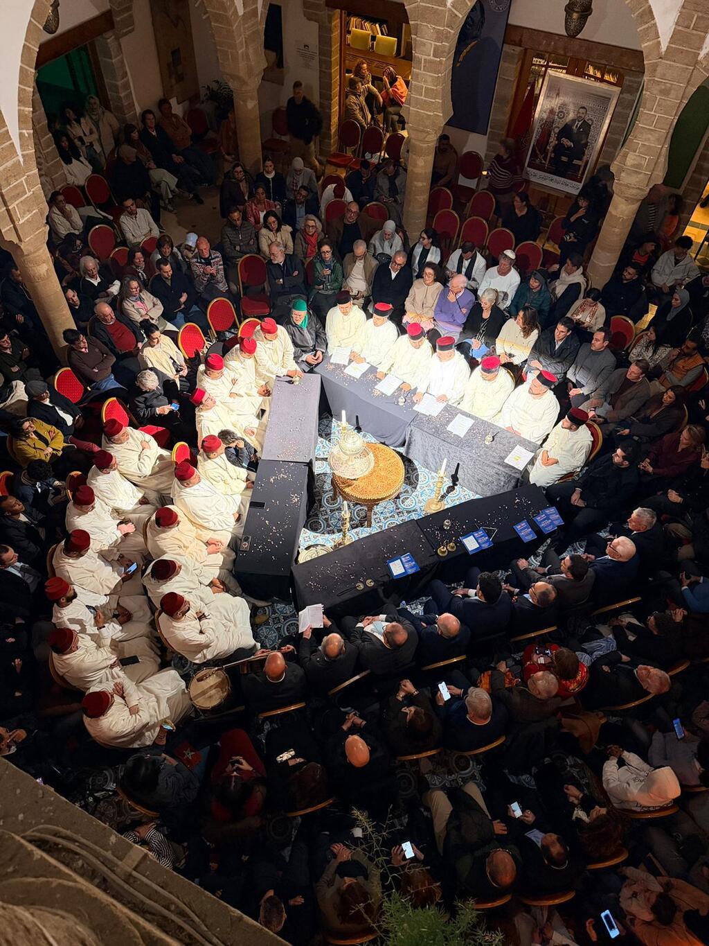 Israeli paytanim and Moroccan Muslim chanters gather for a joint performance during the Three Religions Festival in Essaouira, Morocco, February 2026, as an audience looks on from the historic Beit Dakira Jewish museum (Photo: Mayer Cherem) Israeli paytanim and Moroccan Muslim chanters gather for a joint performance during the Three Religions Festival in Essaouira, Morocco, February 2026, as an audience looks on from the historic Beit Dakira Jewish museum
