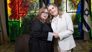 מיכל הרצוג וסליביה קוניו 