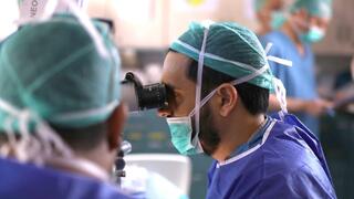  Prof. Michael Mimouni, head of the Cornea Unit at Rambam Health Care Campus, during a corneal transplant surgery 