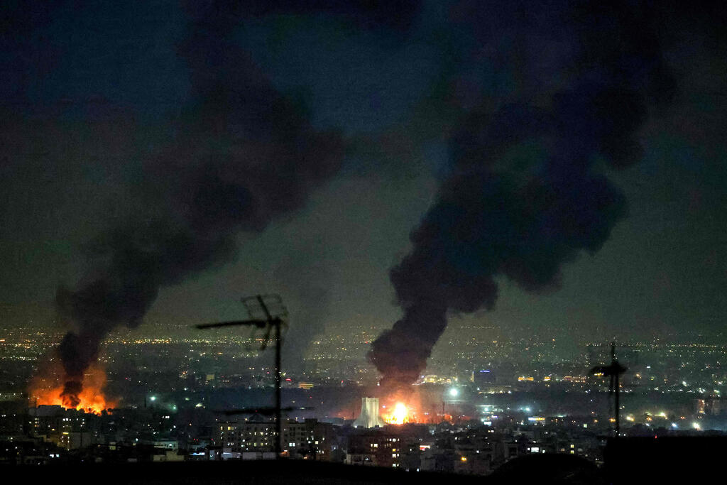 Photo: ATTA KENARE / AFP תקיפות בטהרן