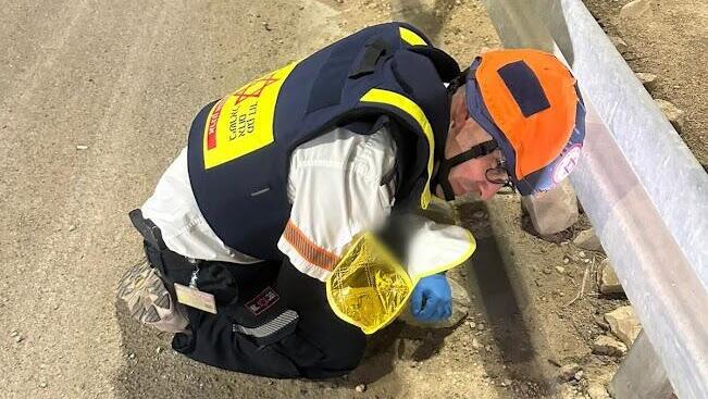 Elad Pas shielding the baby 