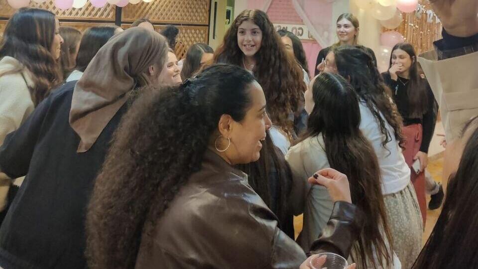 Liraz on the dance floor with family, friends and complete strangers