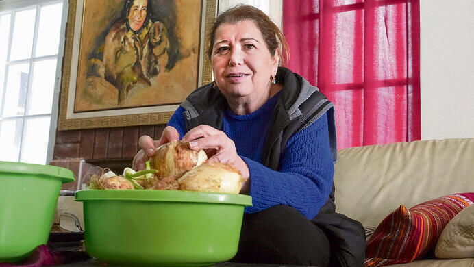 Ora Hatan prepares food for soldiers instead of serving customers in her restaurant 