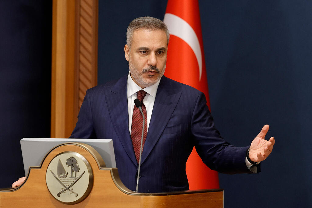 Hakan Fidan (Photo: Karim JAAFAR / AFP) פידאן