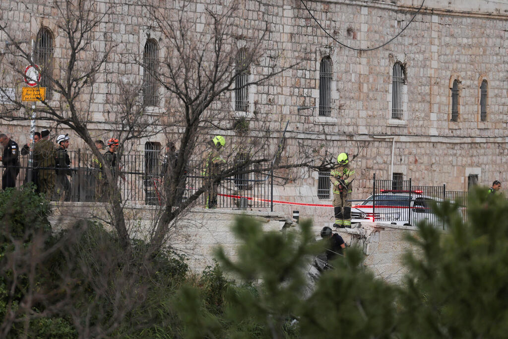 The scene in Jerusalem (Photo: Reuters/Ammar Awad) זירת הנפילה בירושלים