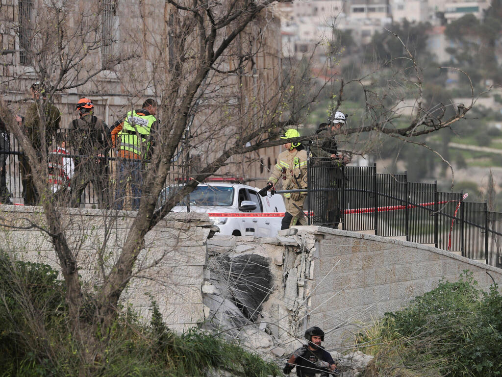 Photo: Reuters/Ammar Awad זירת הנפילה בירושלים