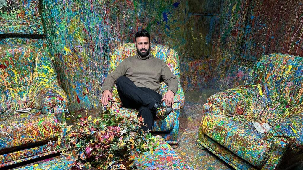 Artist Sam Halaby sits inside his House of Colors in Daliyat al-Karmel, northern Israel 