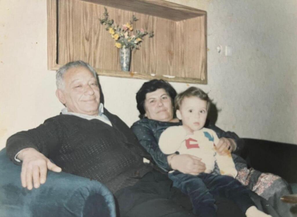 'My dream is to return and visit,' D. as a child with his family in Iran דויד רם