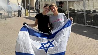 Lily Feinstein and Noa Haron, co-founders of Mini Mitzvahs, at an army base in the south of Israel, 2025 