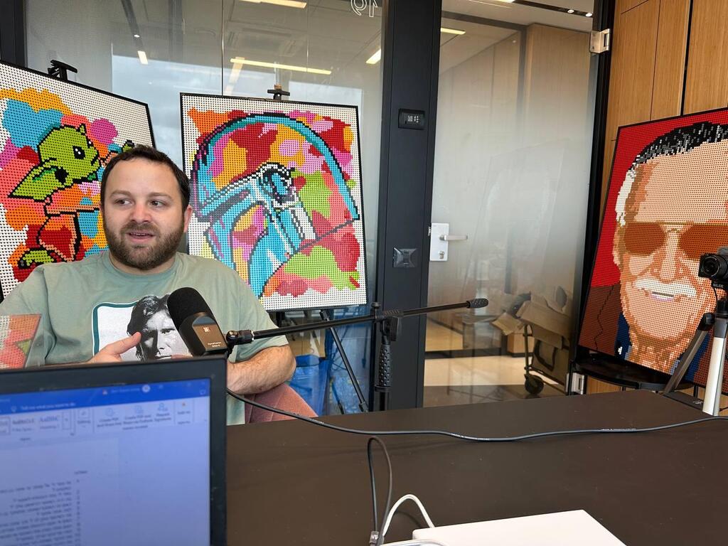 Elan speaks during an interview beside his LEGO mosaic works (Photo: Bar Gindy) Ilan speaks during an interview beside his LEGO mosaic works