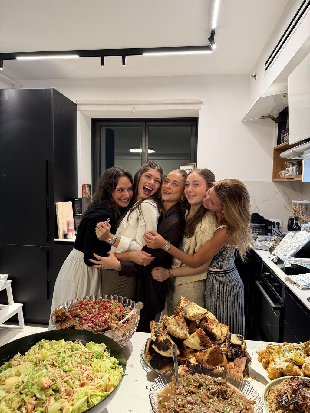 Janie Levitan, Noa Haron, Michal Shabi, Tali Fiske and Lily Feinstein celebrate Shabbat at their apartment in Herzliya, 2025 (Photo: Courtesy Lily Feinstein) Janie Levitan, Noa Haron, Michal Shabi, Tali Fiske and Lily Feinstein celebrate Shabbat at their apartment in Herzliya, 2025