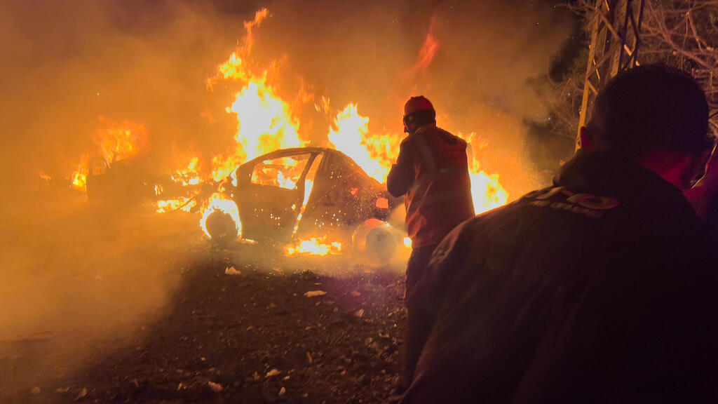Удар по Бейруту (Фото: Hussein Malla/AP) תקיפת חיל האוויר בביירות