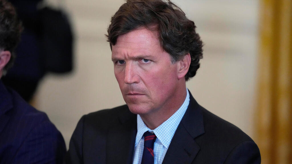 Tucker Carlson has defended Oliviera (Photo: Alex Brandon/AP) טאקר קרלסון