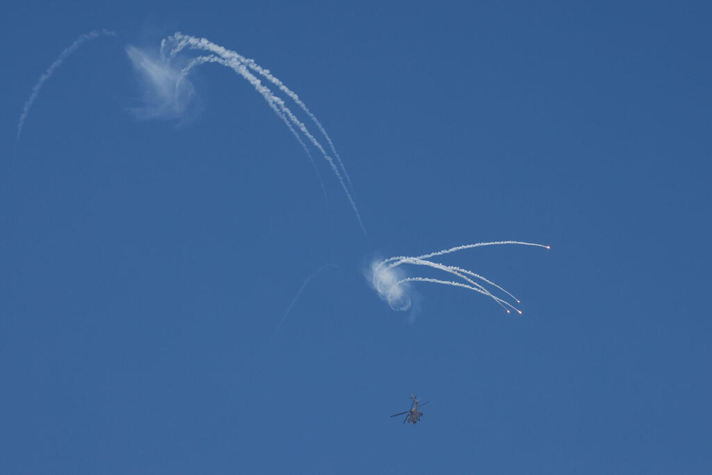 Archival: Hezbollah projectiles intercepted over northern Israel (Photo: Jalaa MAREY / AFP) שיגורים מלבנון לשטח ישראל