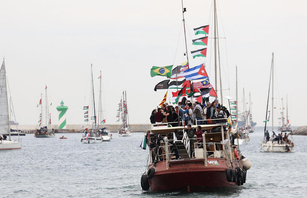 Boats of a new humanitarian flotilla bound for the Gaza Strip make a symbolic leave from Barcelona's Port Vell (Photo: Josep Lago/ AFP) Boats of a new humanitarian flotilla bound for the Gaza Strip make a symbolic leave from Barcelona's Port Vell