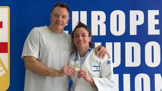 נלסון-לוי עם מאמן העל שני הרשקו