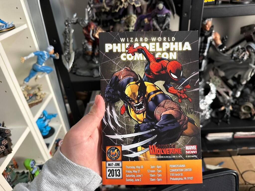 A 2013 Wizard World Philadelphia Comic Con program is held inside Eitan’s collection room 