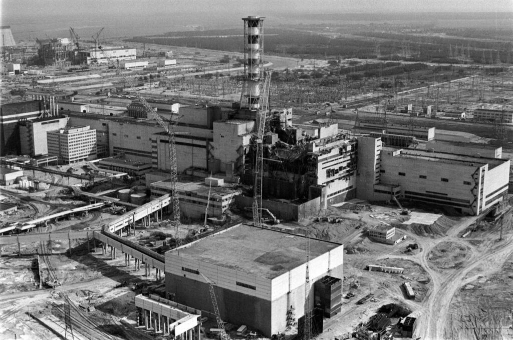 The Chernobyl nuclear plant is seen in an aerial view, showing the damage from an explosion and fire on April 26, 1986, that sent a radioactive plume over Europe 