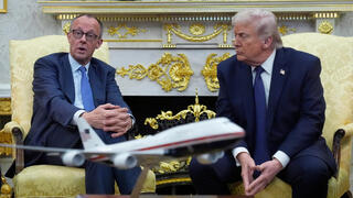President Donald Trump meets with German Chancellor Friedrich Merz in the Oval Office at the White House earlier this month
